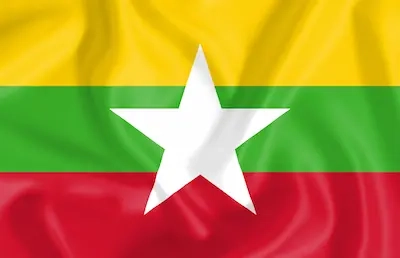 Horizontale banen van geel, groen en rood met een grote witte ster in het midden.